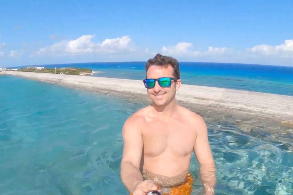 Brandon in the infinity pool at Secrets.